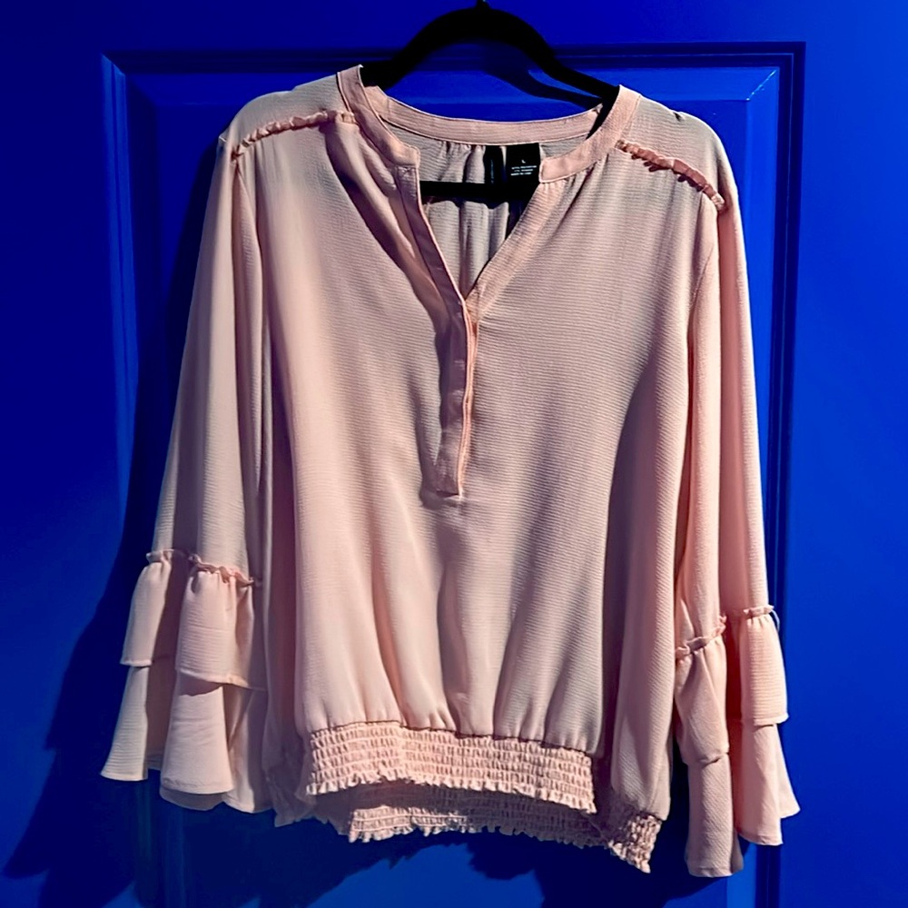 Pink blouse with flare sleeves